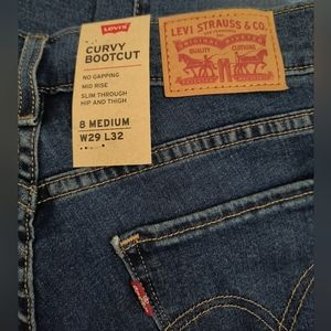 CURVY BOOTCUTNO GAPPING MID RISE SLIM THROUGH HIP AND THIGH 8 MEDIUM W29 L32